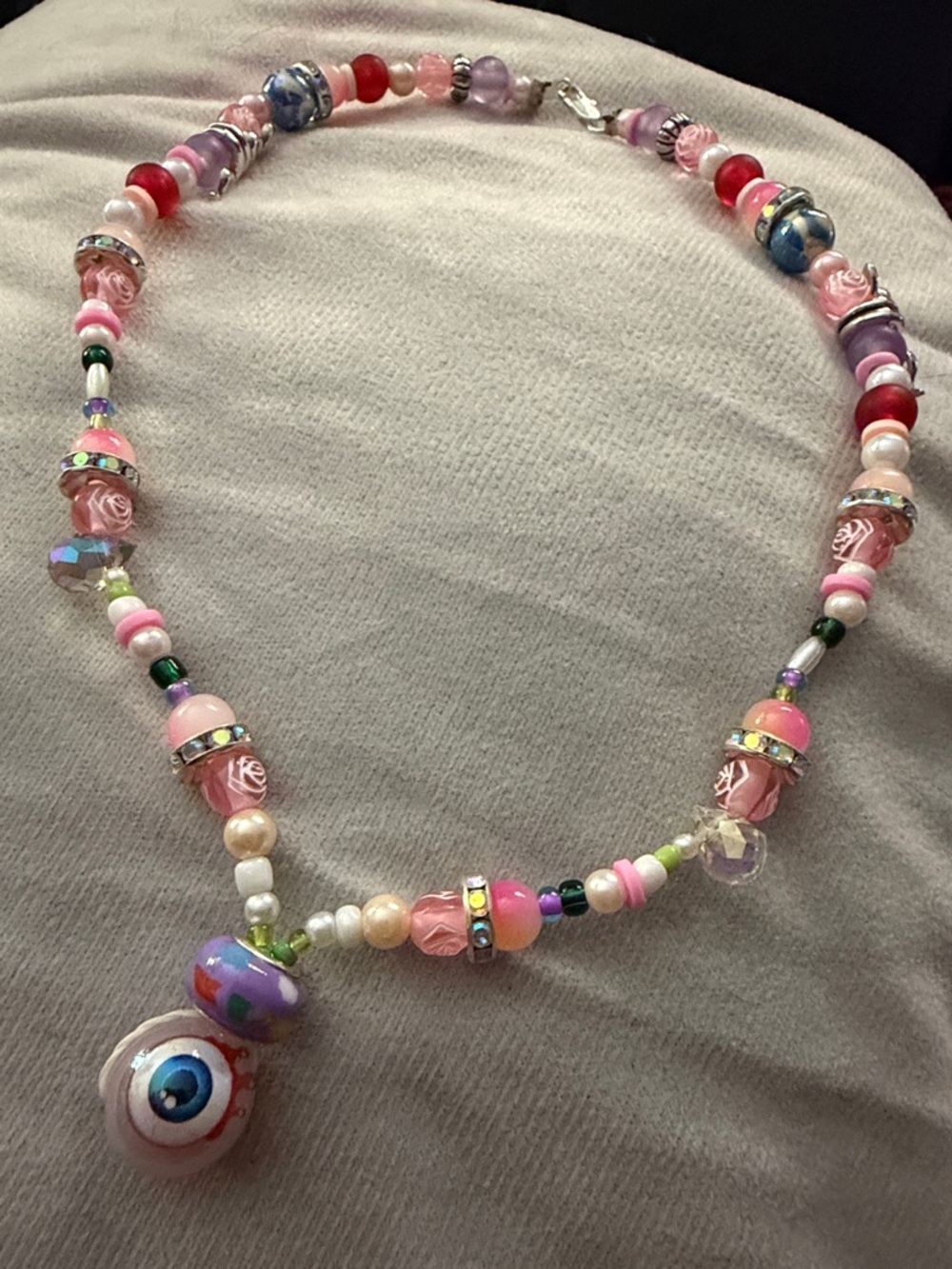Handcrafted Pink Multi-Bead Necklace with Glass Eye Pendant